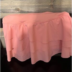 Peach athletic skirt with shorts built it